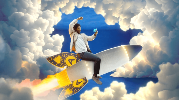 Man riding a rocket through clouds with butterflies, from Admiral's Flutter Feeling campaign