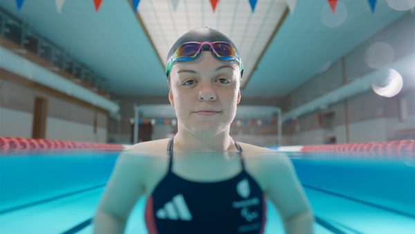 Paralympic swimmer in goggles at a pool, from the LV= Channel 4 sponsorship